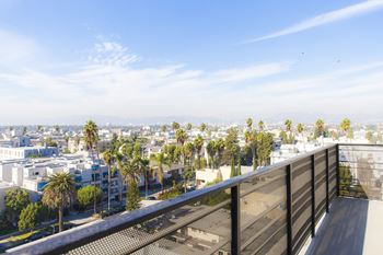 a view of the city from a balcony
